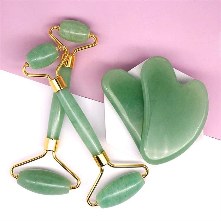 Massagem do rolo de rosto gua sha